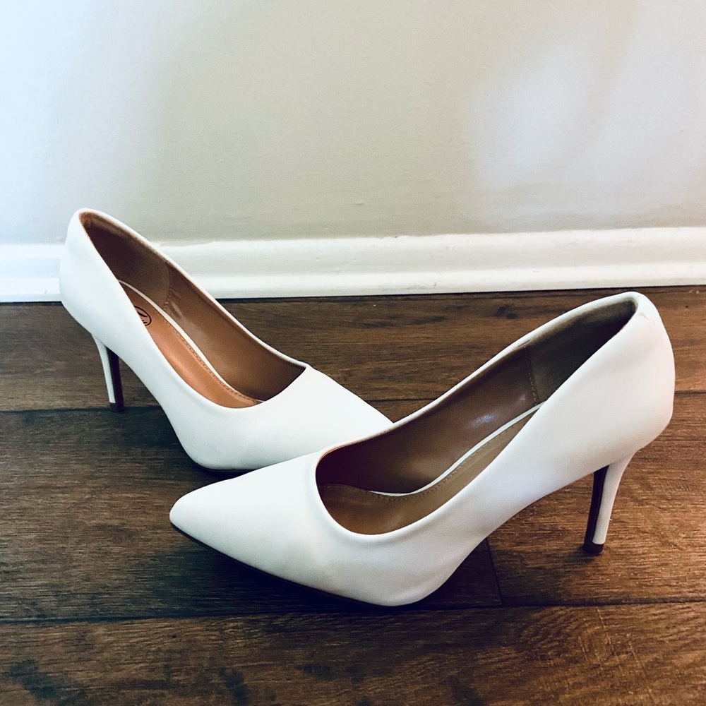White pointy heels